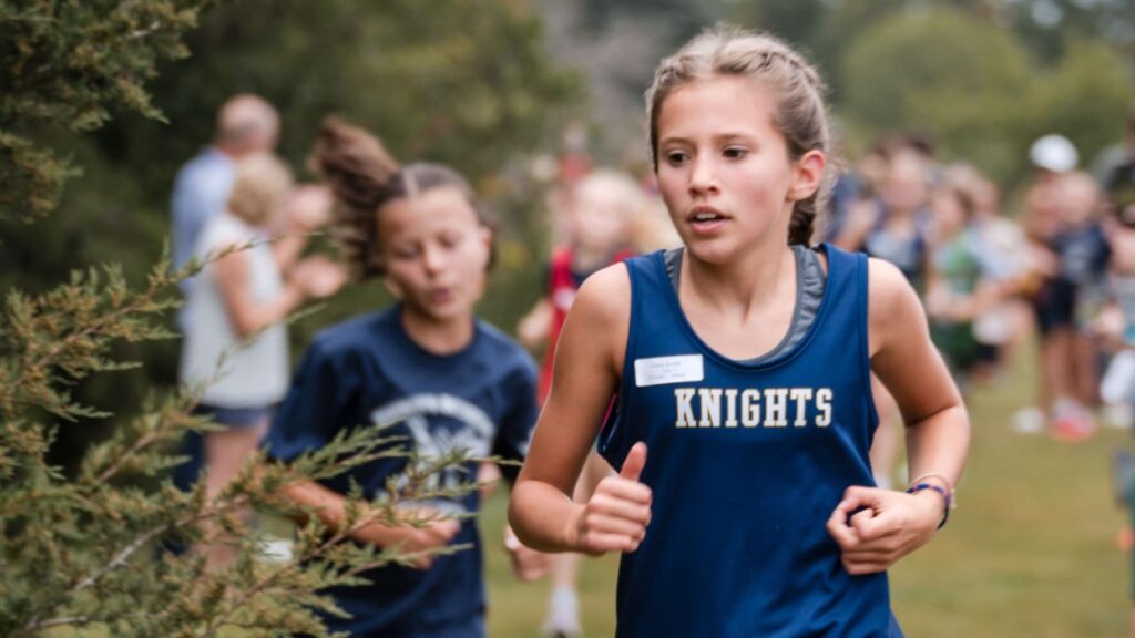 Girl running knights cross country