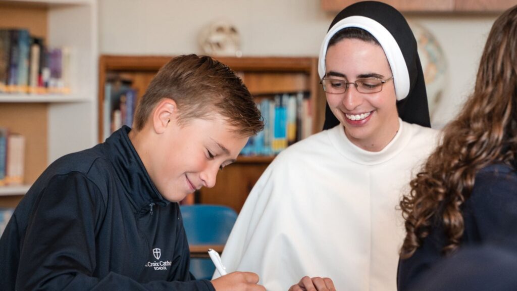 Nun teaching students classroom