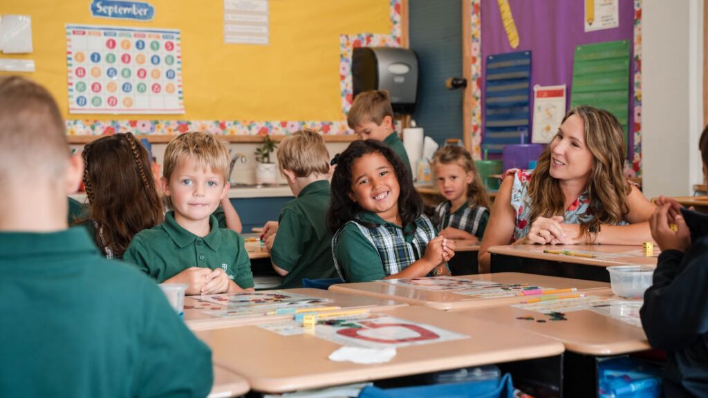 K smiling girl teacher