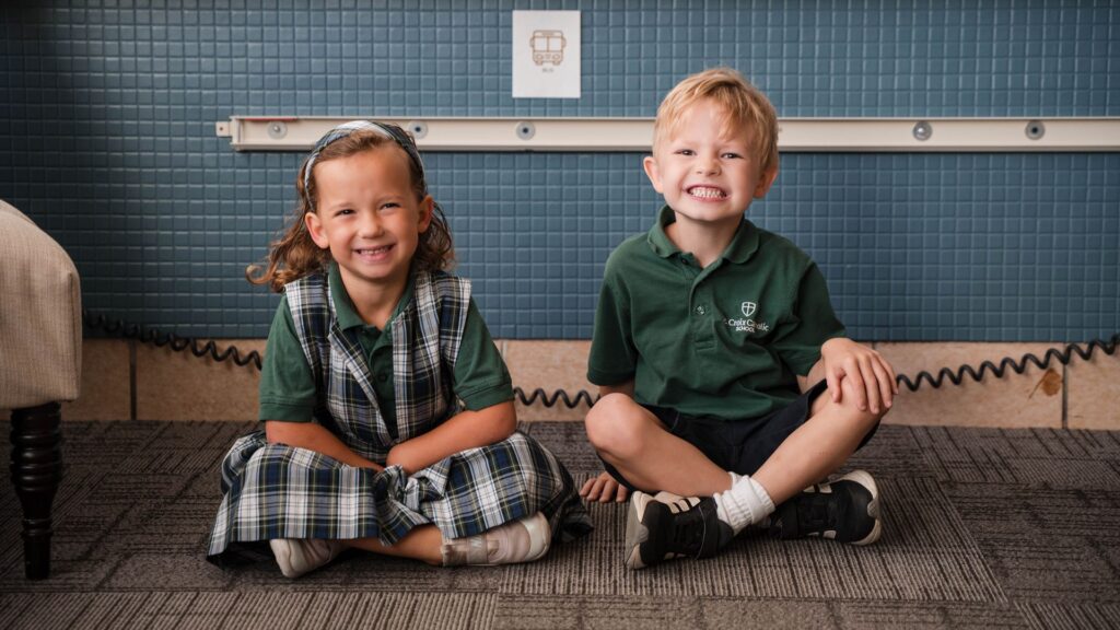K students smiling boy girl