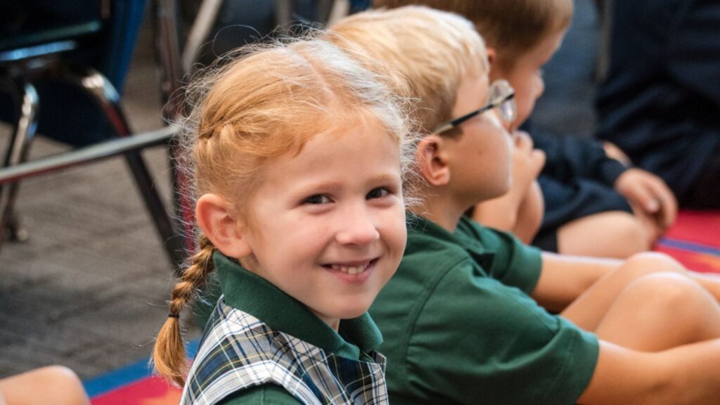 Smiling girl school event
